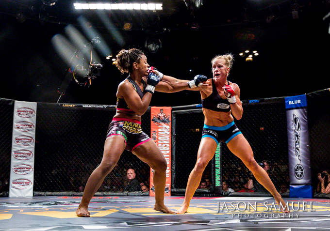 Dramatic lighting on fighters at Legacy Fighting Championship 21