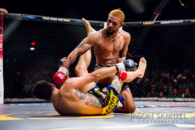 MMA fighter throwing an elbow at Legacy Fighting Championship 21